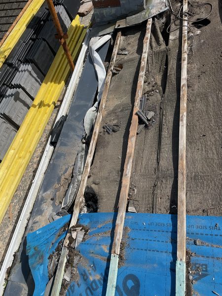 Roof repair — stripped battens and new felt