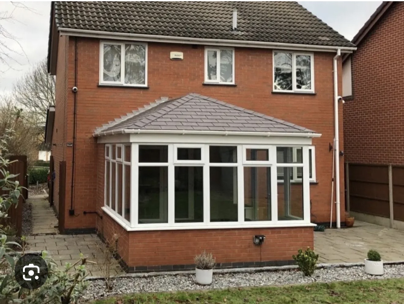Conservatory converted to a solid insulated tiled roof, Crosby