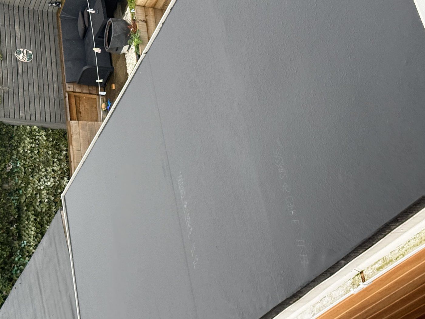 New EPDM rubber garage roof completed by Select Roofing Services in Crosby