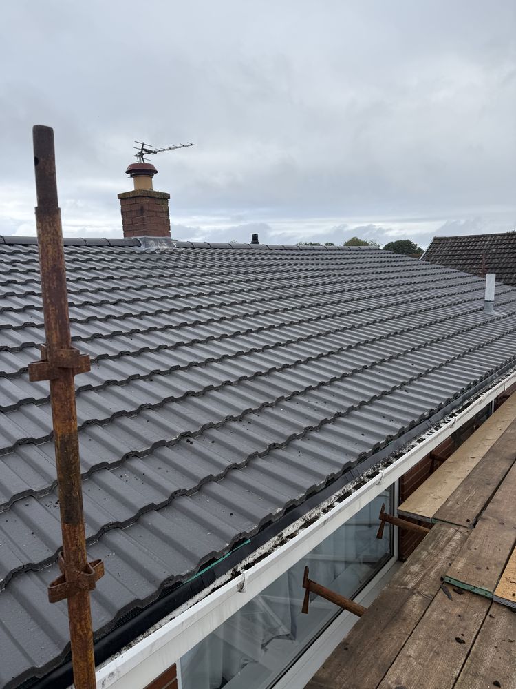 Newly completed concrete interlocking tile roof, Crosby