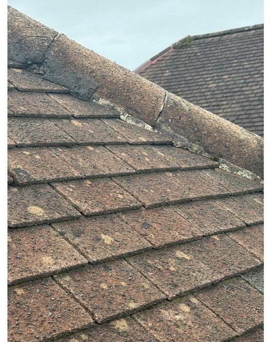 Open joints and failed mortar to the hip line &mdash; roof survey, Maghull